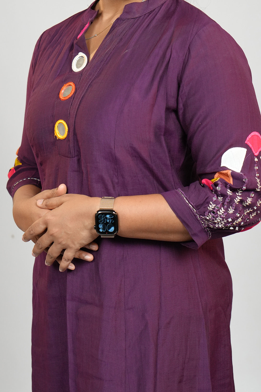 Close up of sleeve and neckline detailing on Aroha Amethyst plum co-ord set