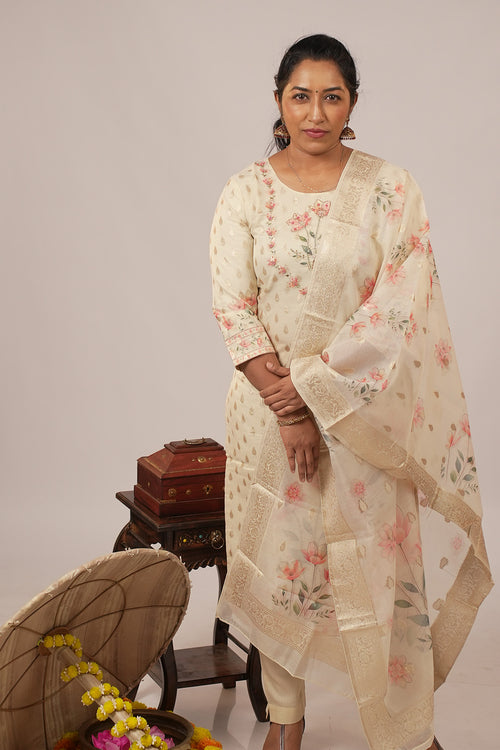 Woman wearing Aroha Blush Petals co-ord set with arms crossed