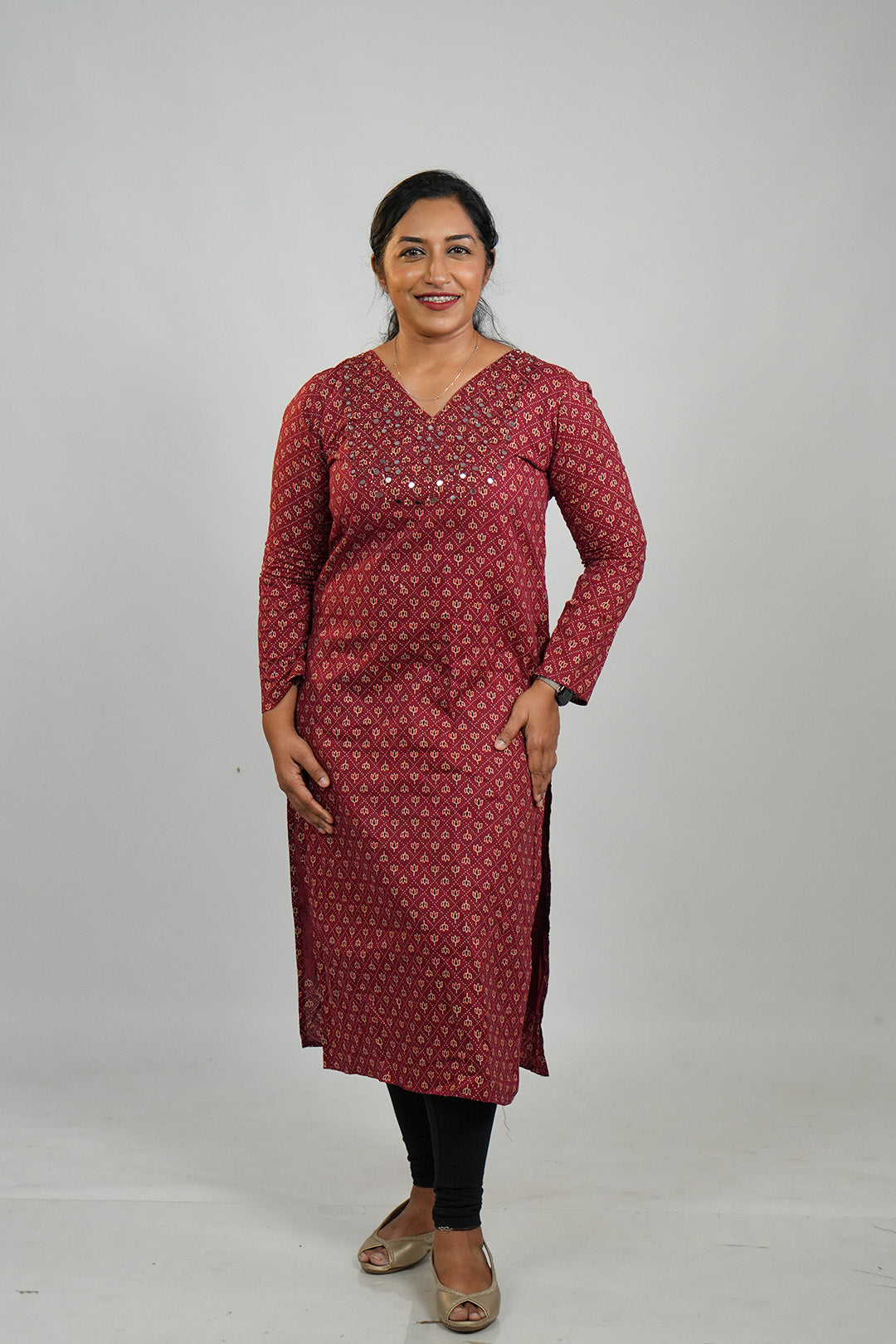 Woman wearing Aroha Chamak Cotton Kurti in a minimal queen pose