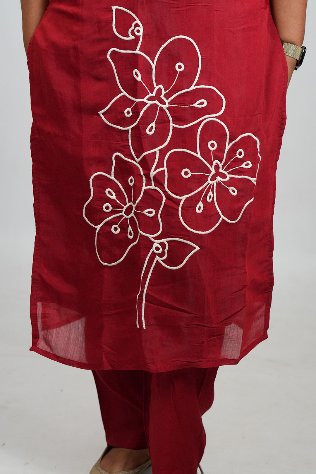 Close up of pant detailing on Aroha Crimson Muse red co-ord set