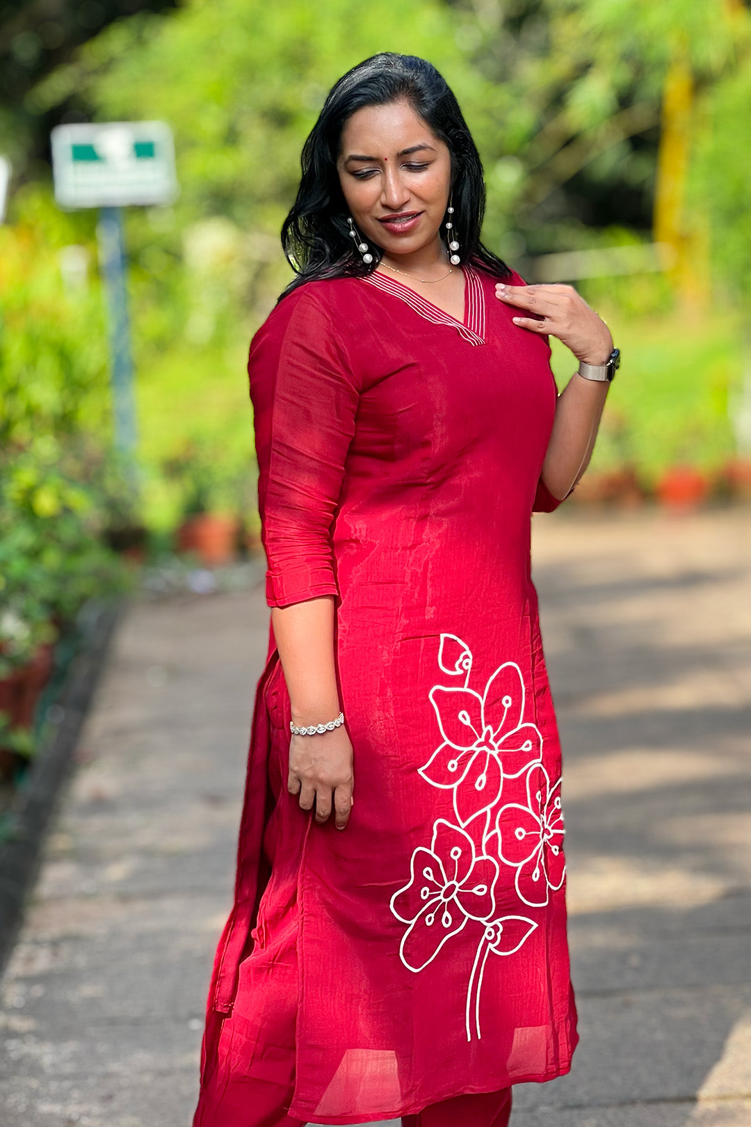 Aroha Crimson Muse red co-ord set, styled view