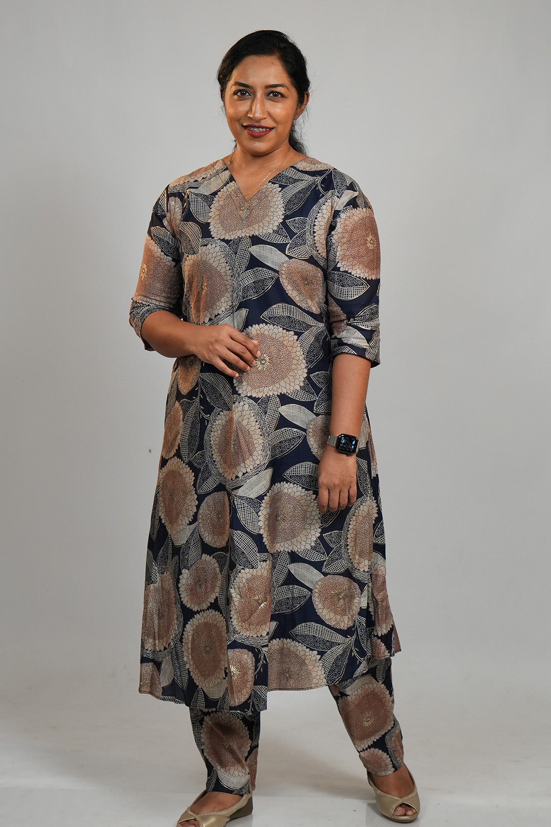Woman wearing Aroha Dahlia navy co-ord set in a minimal queen pose