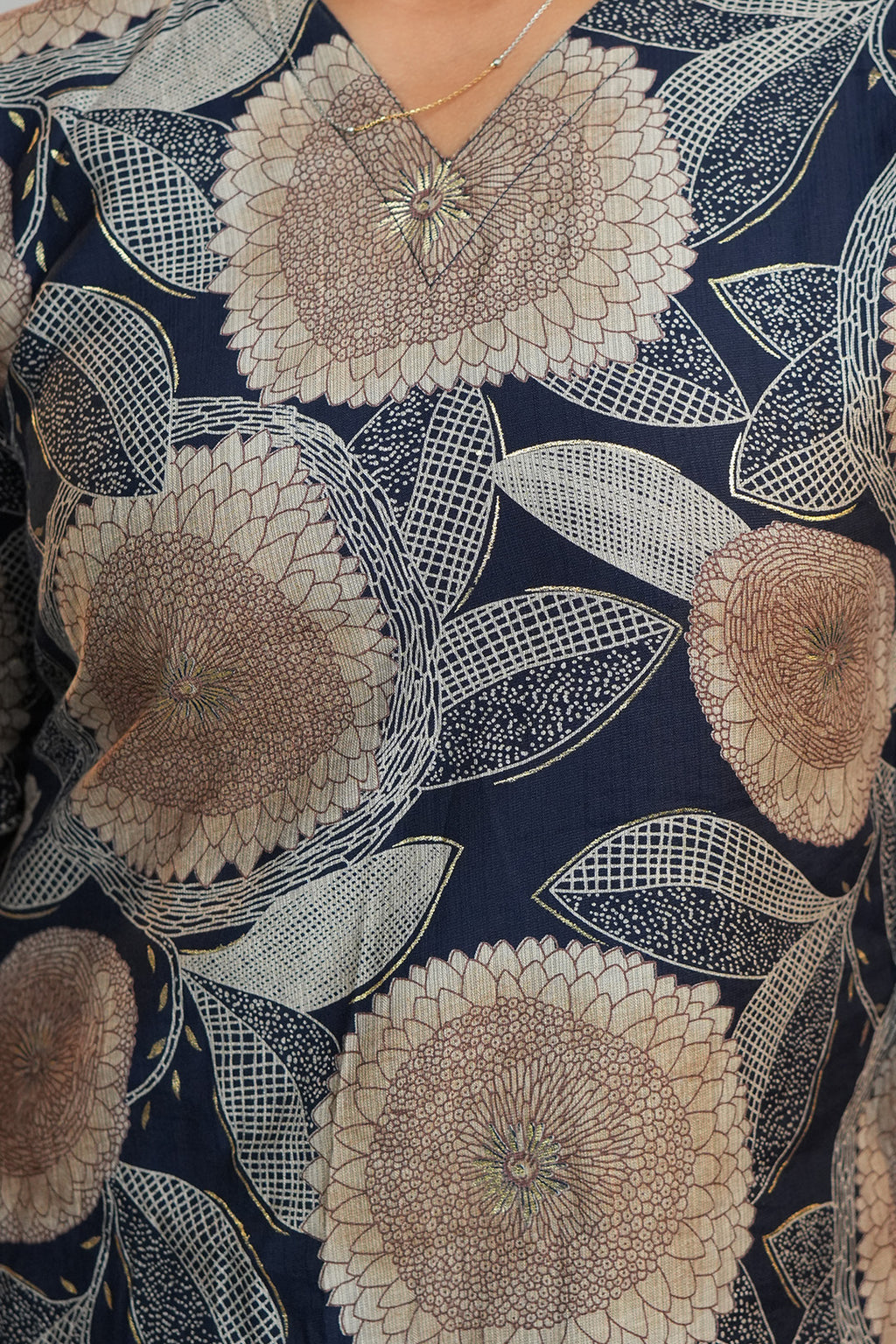Close up of neckline detailing on Aroha Dahlia navy co-ord set
