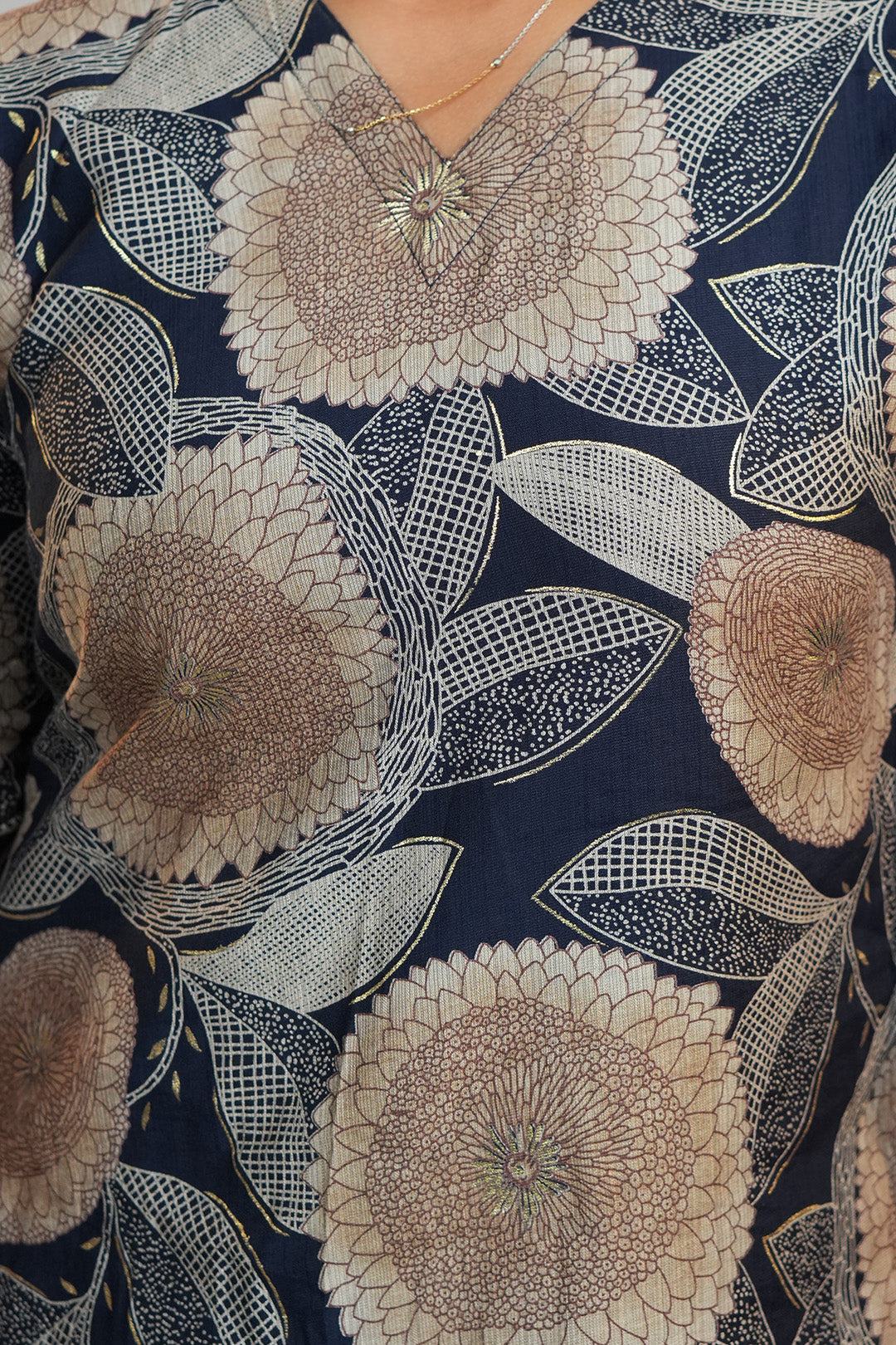 Close up of neckline detailing on Aroha Dahlia navy co-ord set