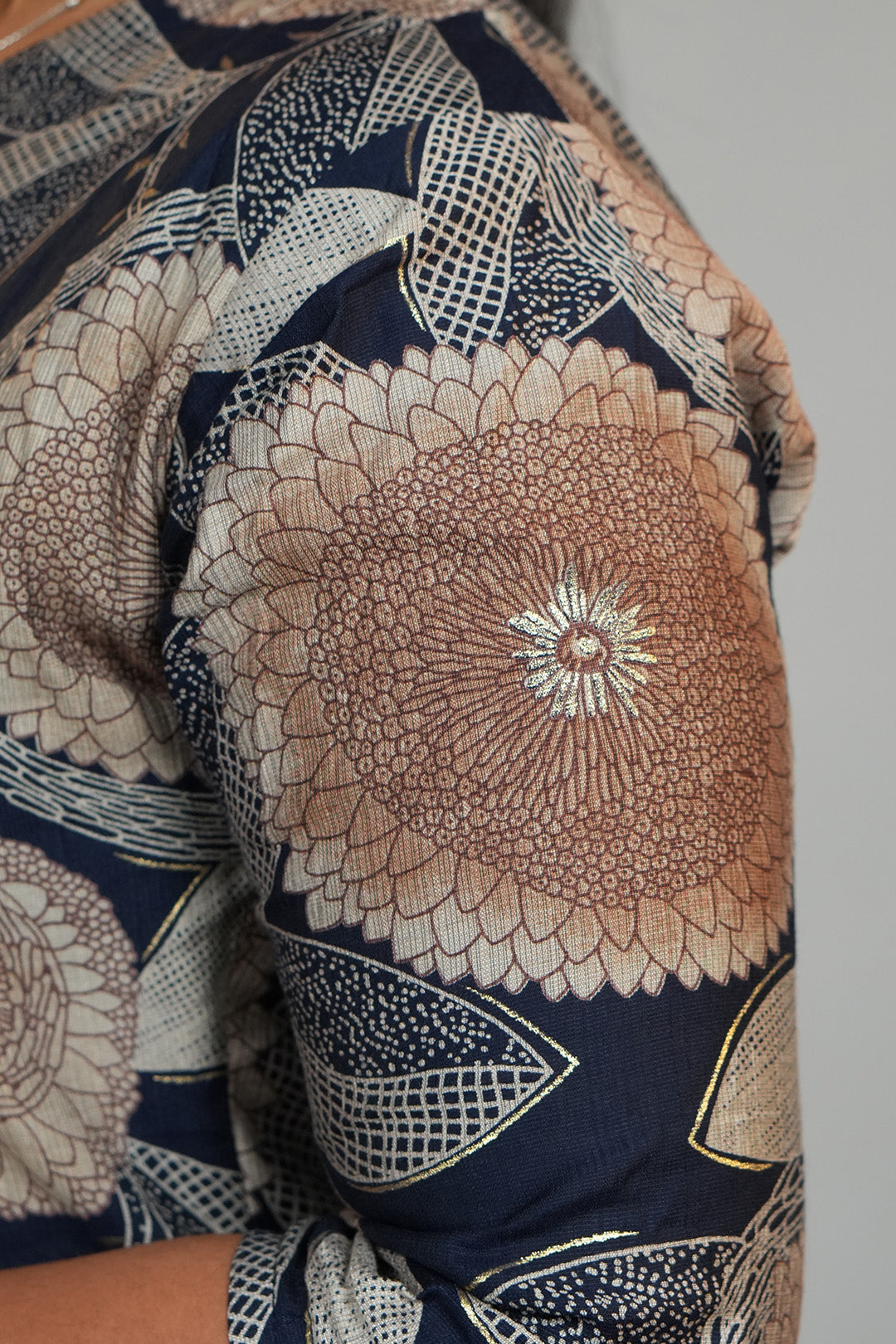 Close up of sleeve detailing on Aroha Dahlia navy co-ord set