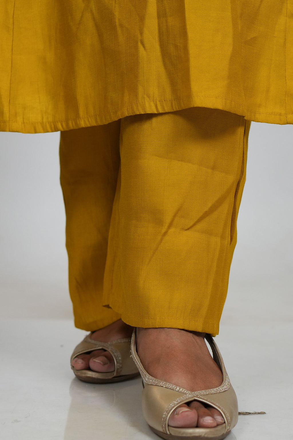 Close up of pant detailing on Aroha Mustard Muse co-ord set