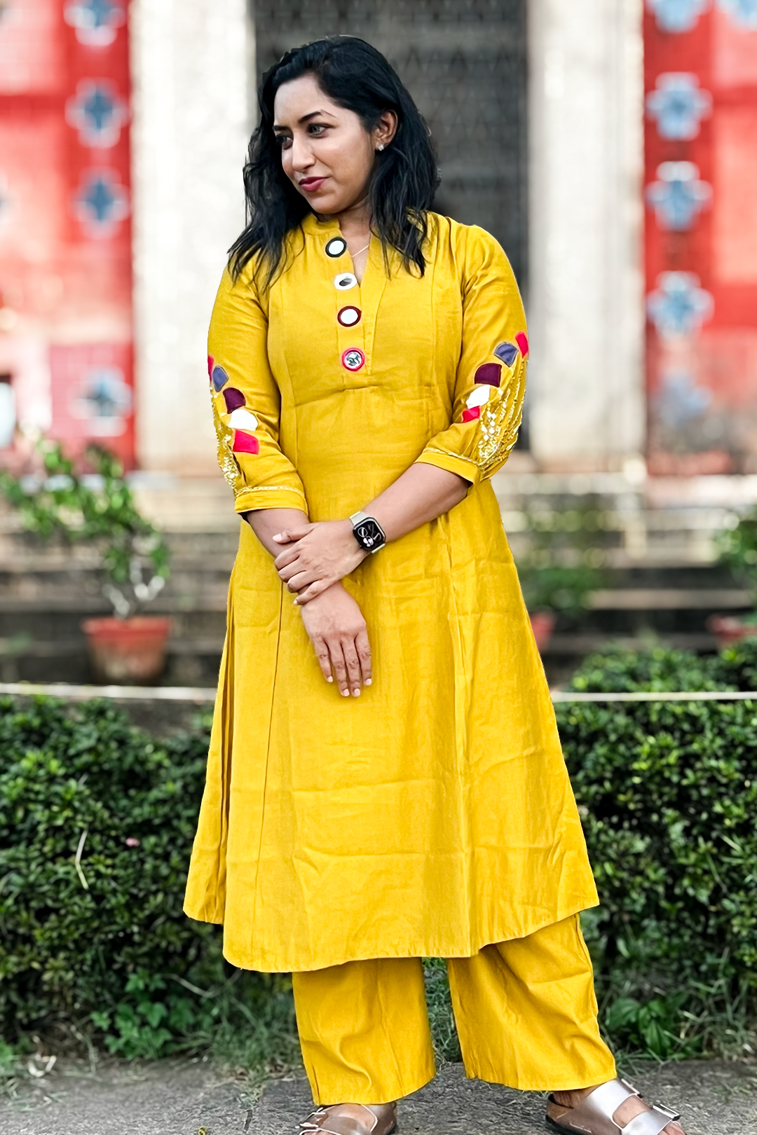 Woman wearing Aroha Mustard Muse golden co-ord set, front view