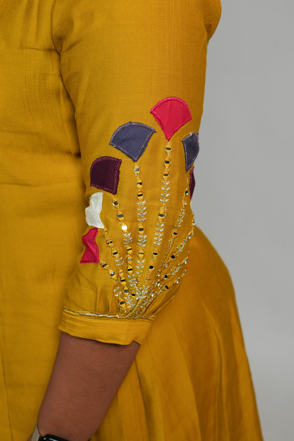 Close up of sleeve detailing on Aroha Mustard Muse co-ord set