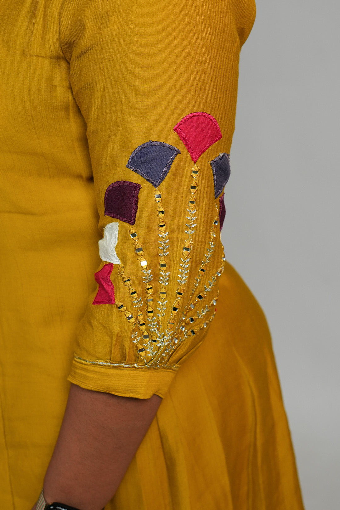 Close up of sleeve detailing on Aroha Mustard Muse co-ord set