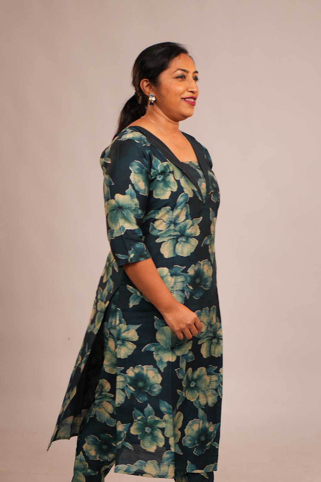 Woman walking candidly in Aroha Oceanic Bloom co-ord set