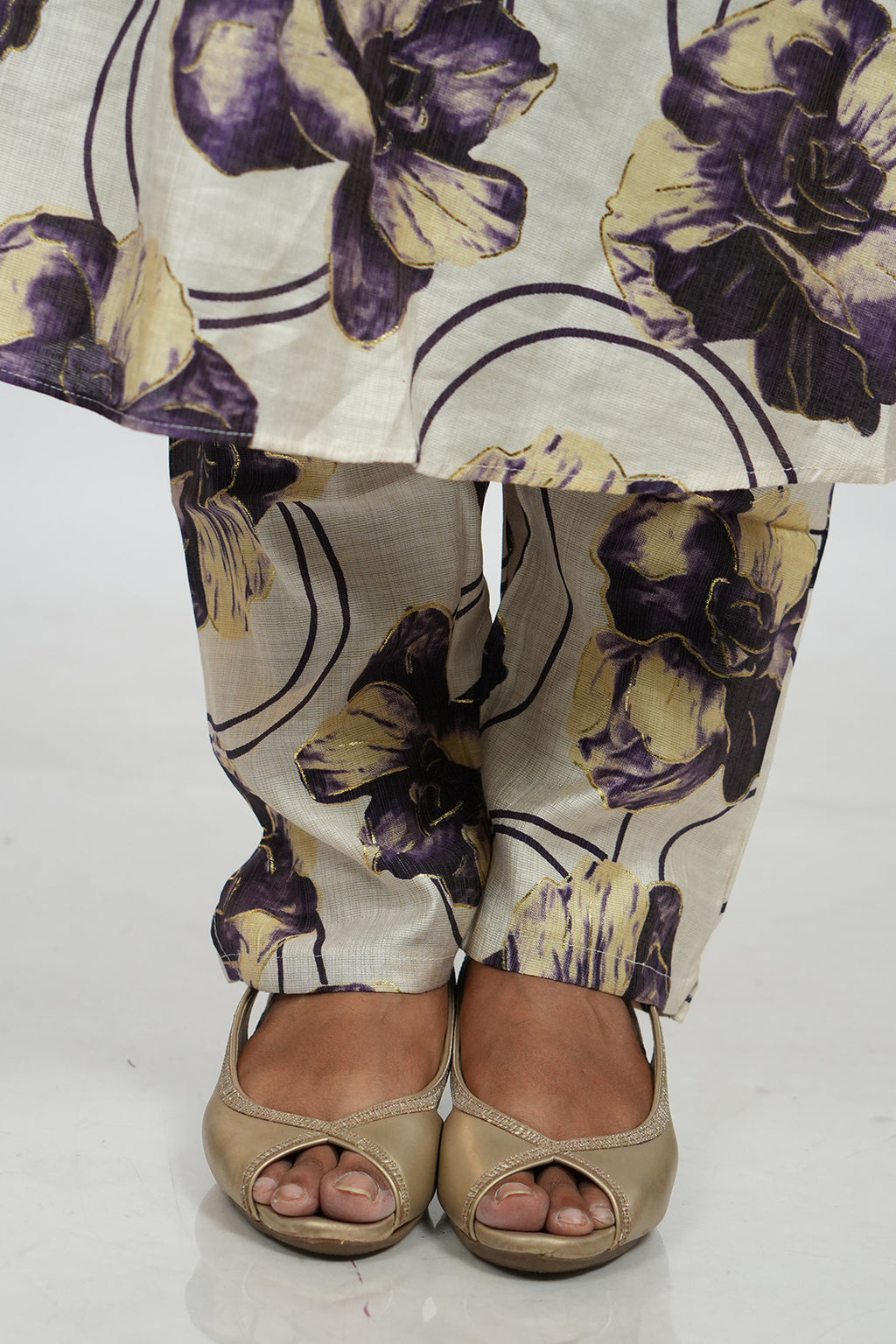 Close up of feet and hem detailing on Aroha Orchid Muse co-ord set