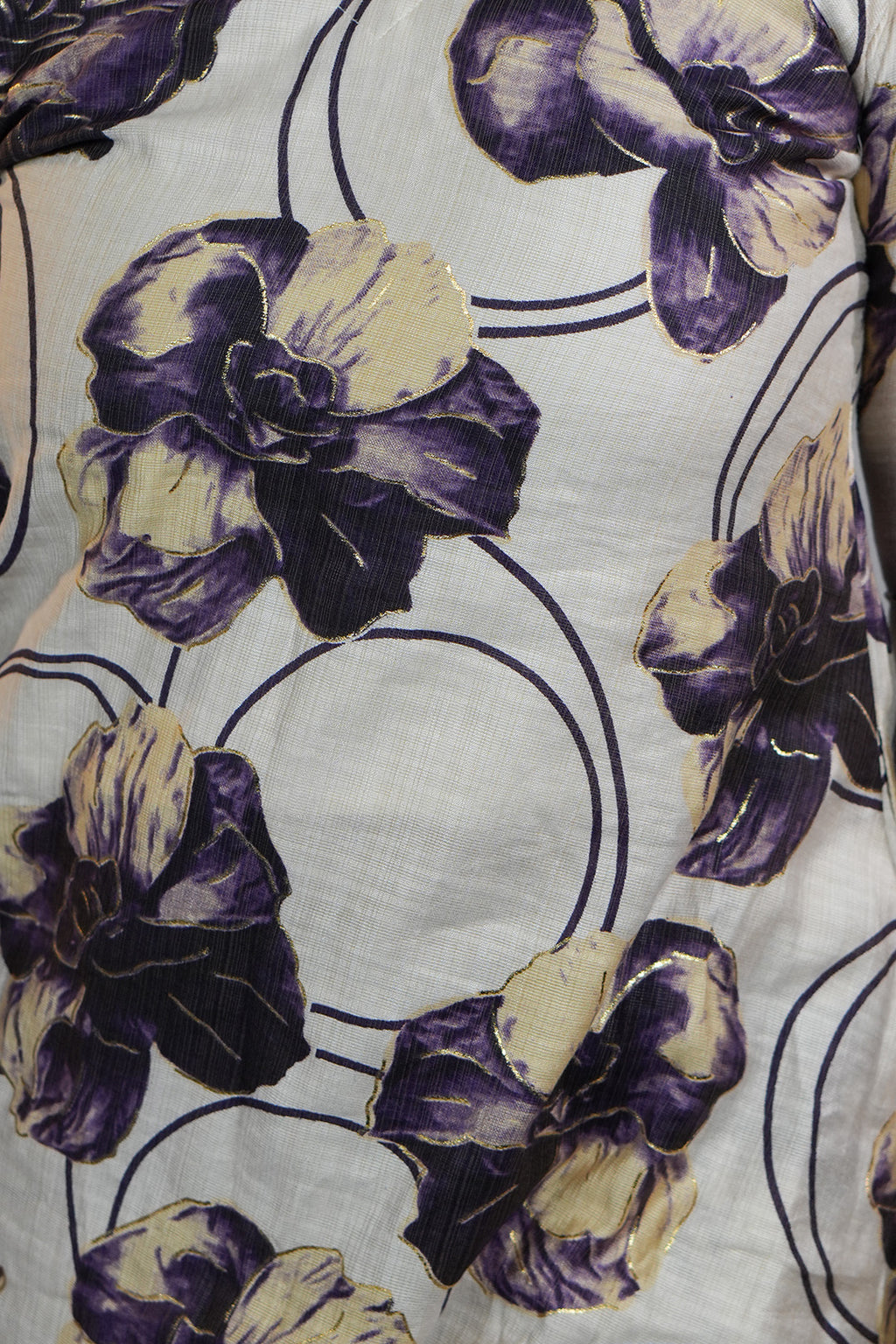 Close up of neckline detailing on Aroha Orchid Muse co-ord set