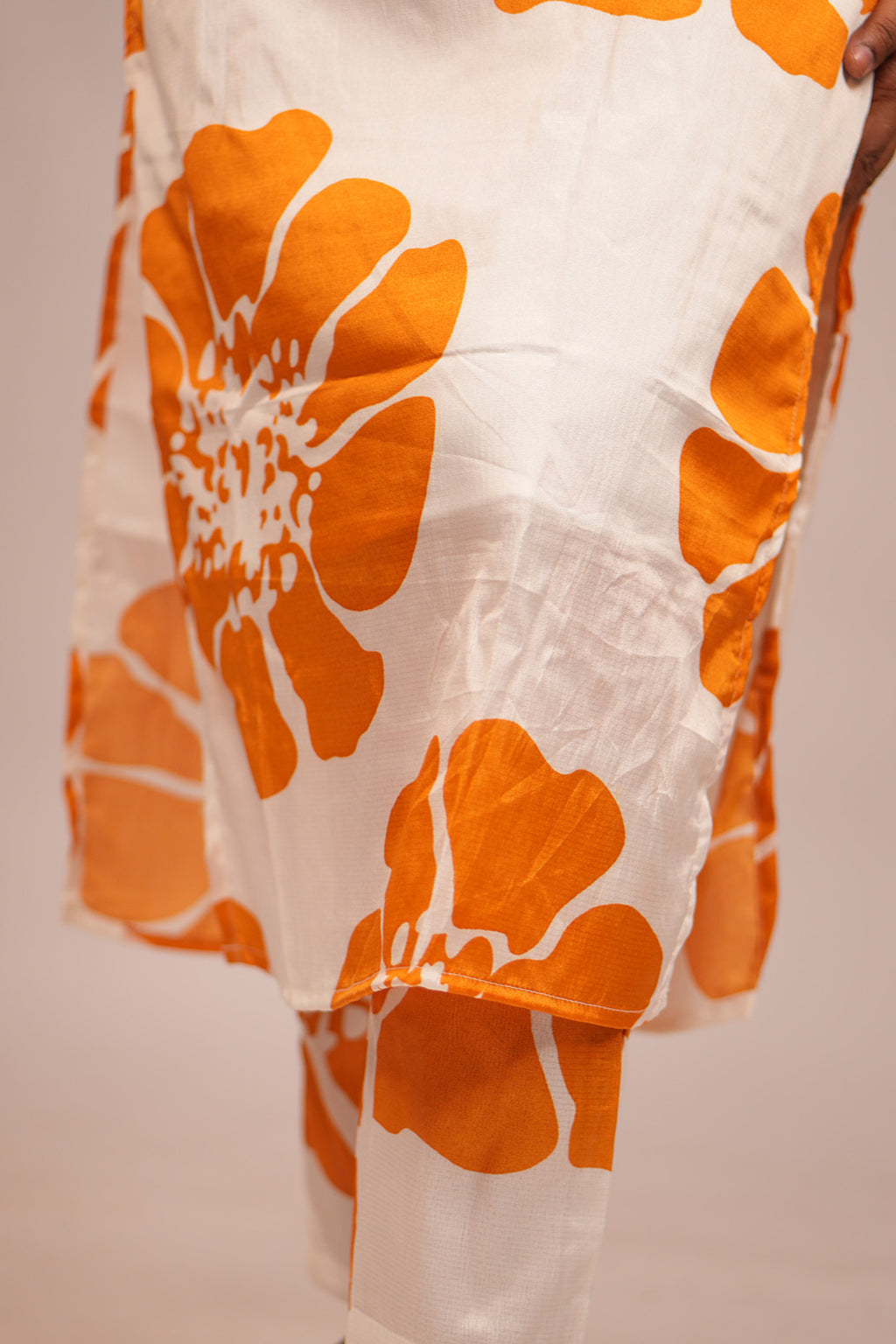 Close up of feet and hem detailing on Aroha Sunflower co-ord set