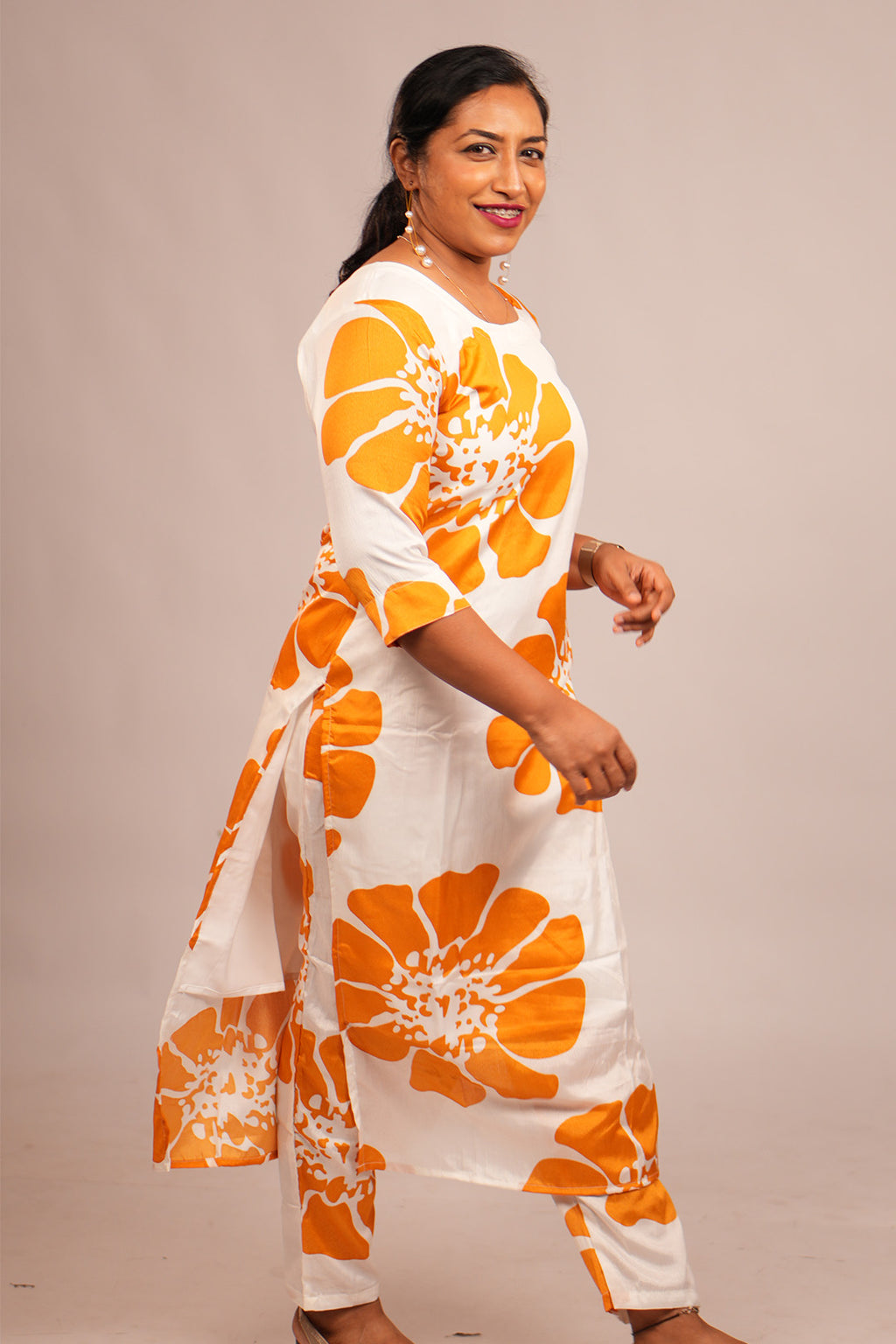 Woman walking candidly in Aroha Sunflower co-ord set